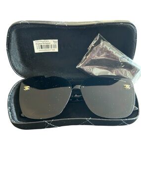 CHANEL Black Rimless Sunglasses with Gold CC Accents